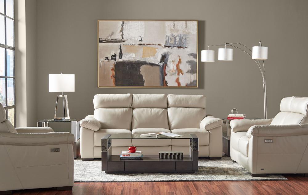 a living room with a large painting