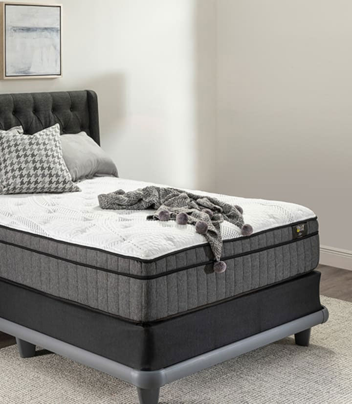 a bed with a blanket on it