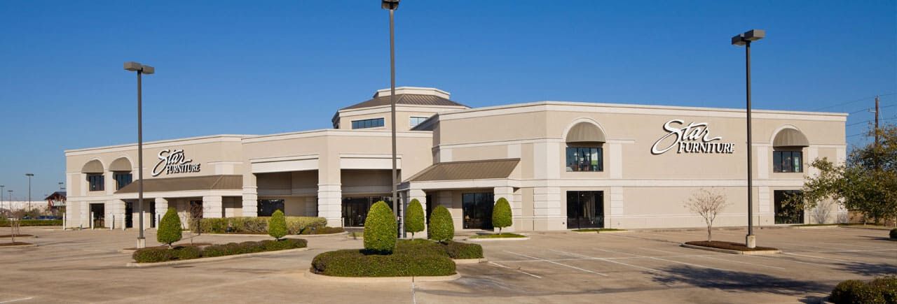 a building with a parking lot